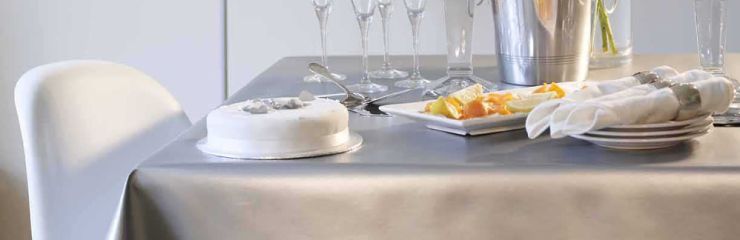 Plain PVC Tablecloths - Uni Colour PVC Tablecloths, available in a wide range of plain colours. Improve the appearance of your vinyl tablecloths with the addition of a bias binding edge finish  Vinyl PVC from &pound;4.00 exc vat per metre For trade enquiries, please contact us